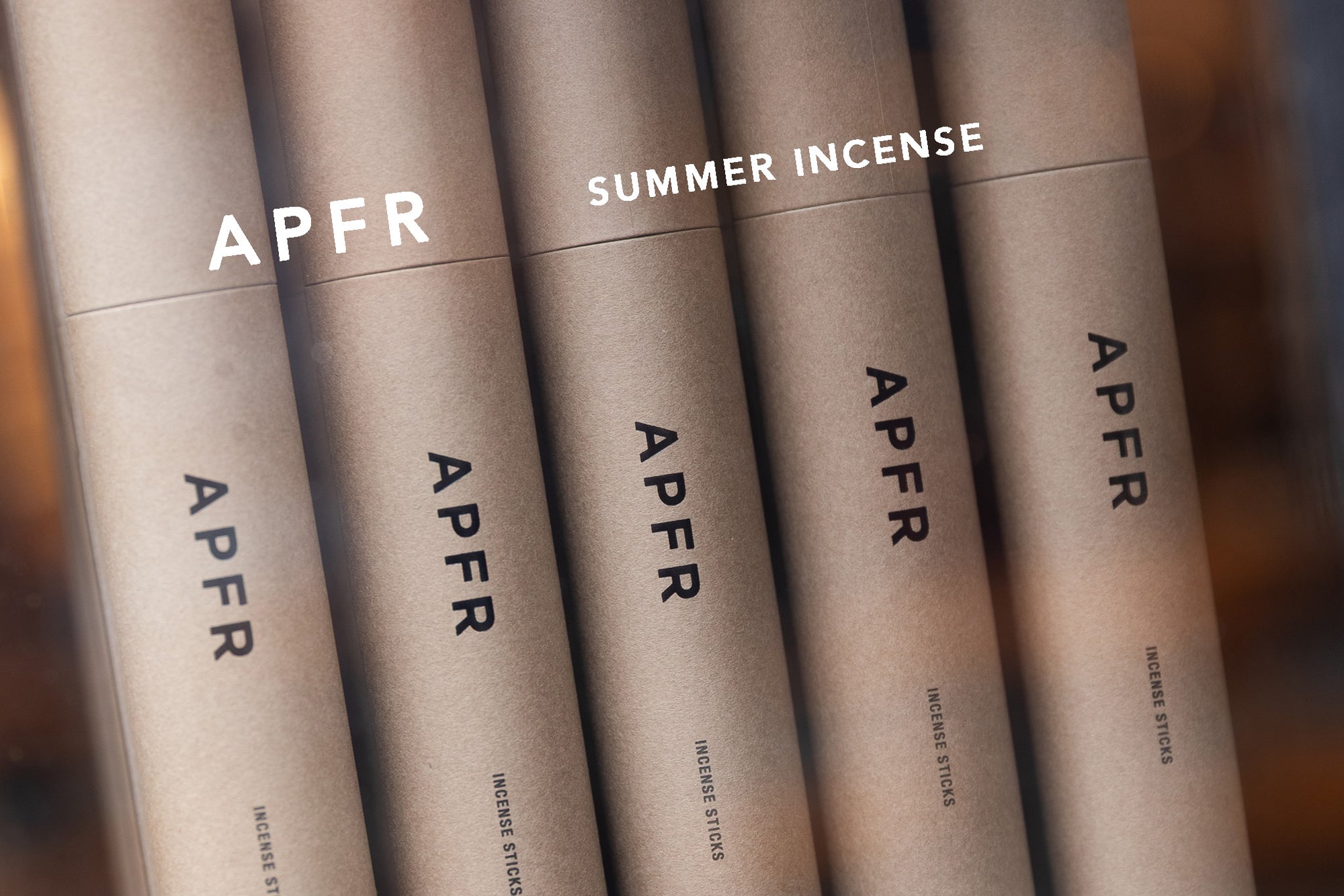 Row of APFR incense sticks with 'Summer Incense' text on a blurred background