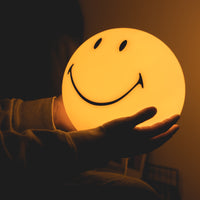 Mr Maria Smiley Star Light lamp lifestyle in hands - BindleStore Manchester