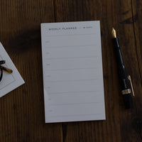 Kartotek weekly planner pad on desk - BindleStore.
