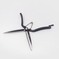 Wide open black metal shears with long blades on grey background