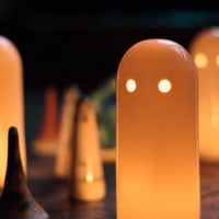 Glowing ceramic candle holders and ceramic talismans